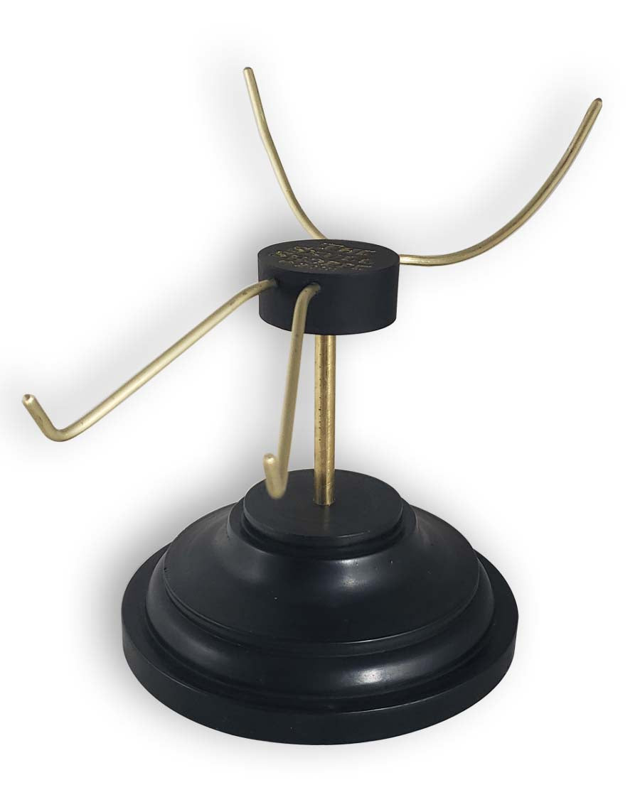 Skull Stand with black base and brass tines.