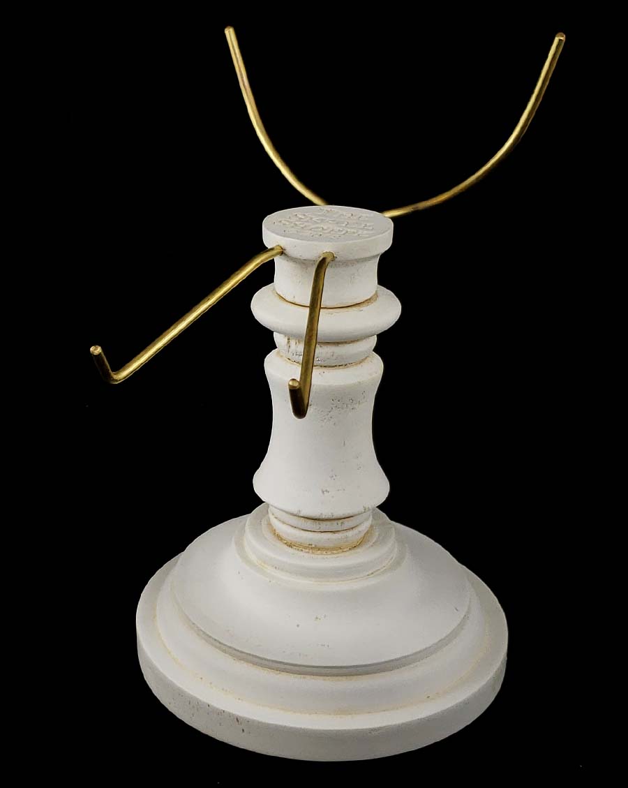 Deluxe antique white pillar skull stand with brass tines.