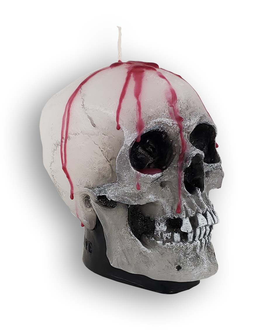 
                  
                    Decorative wax skull candle with dripping blood, facing right
                  
                