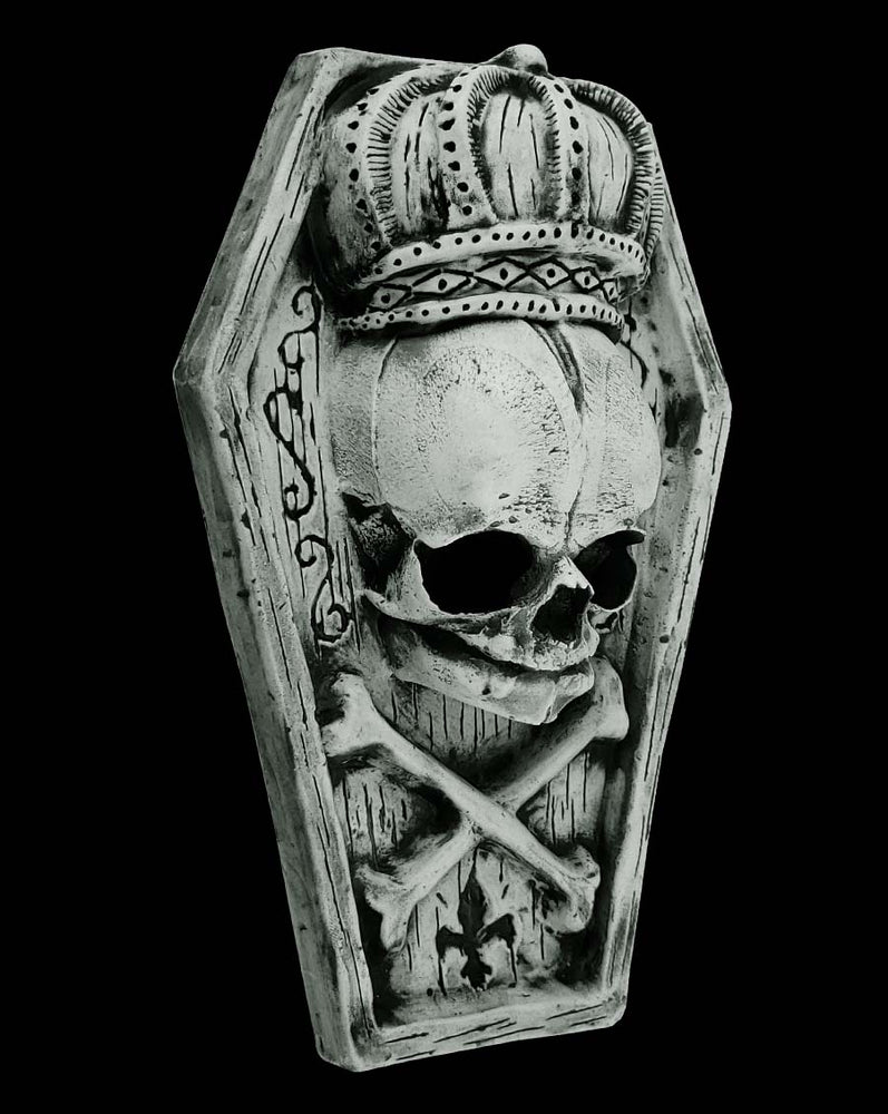 
                  
                    Miniature coffin with skull and crossbones wearing a crown
                  
                