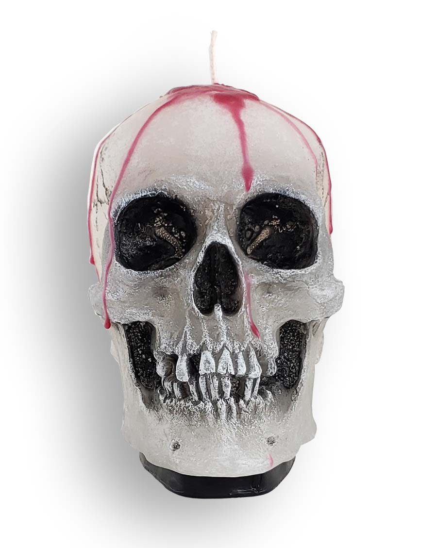 Decorative wax skull candle with dripping blood