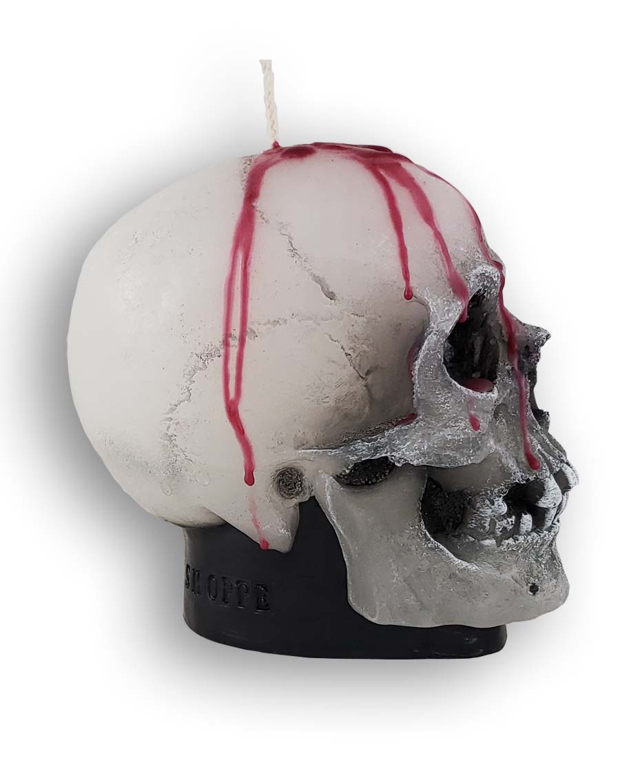 
                  
                    Right profile of decorative wax skull candle with dripping blood
                  
                